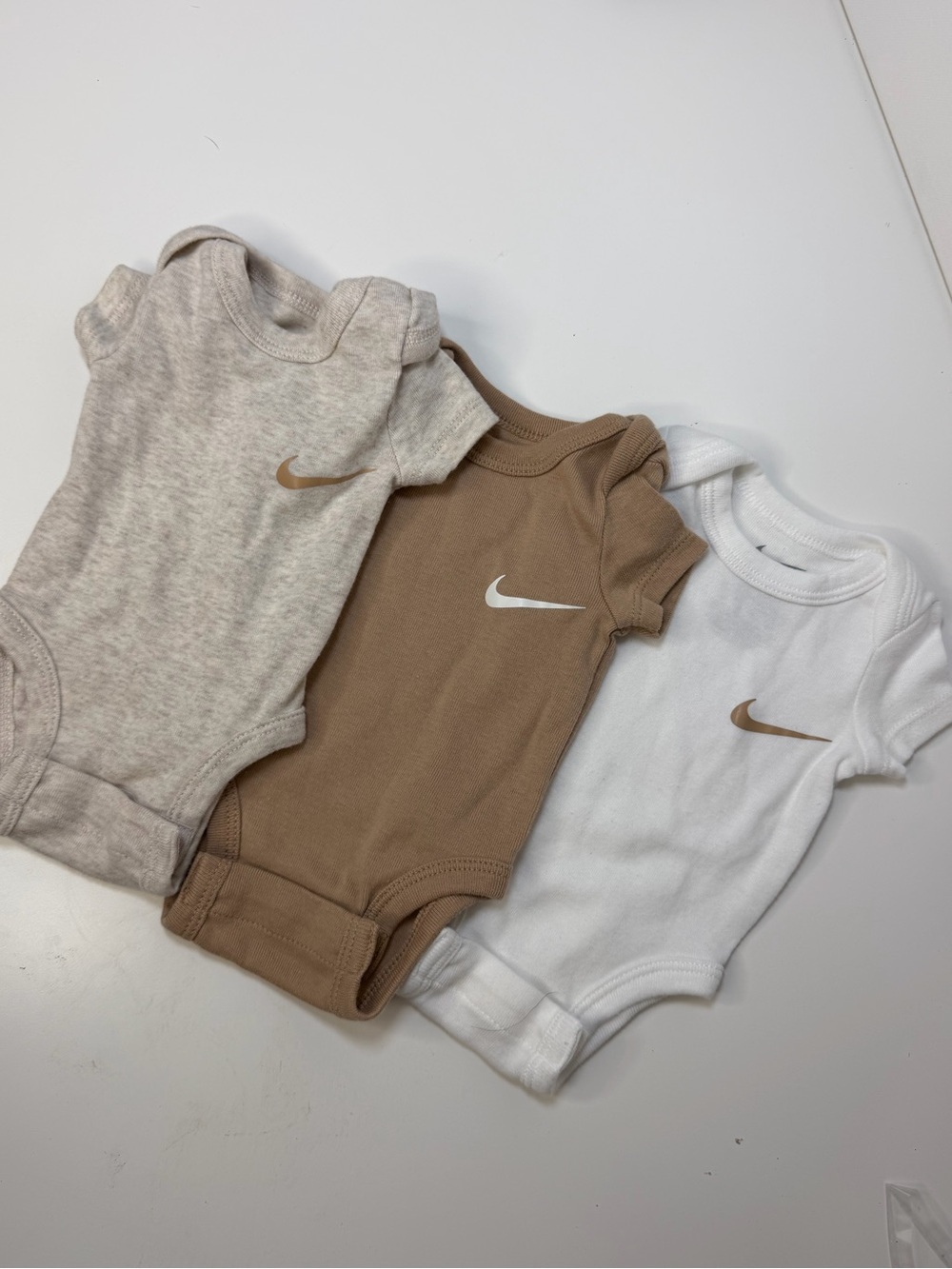 Nike‎ Baby Bodysuit 3-Pack in White, Tan, and Oatmeal